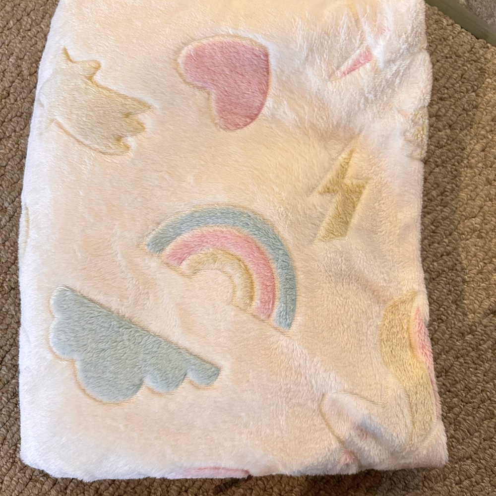Cozy Cream Blanket with Pastel Accents